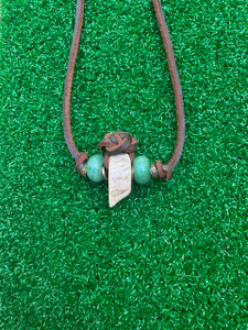 Polished Elk Antler Pendant with Aventurine and Brass Accent Beads on Dark Brown Lace Leather Polished Elk Antler Pendant with Aventurine and Brass Accent Beads on Dark Brown Lace Leather