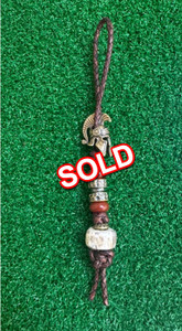 Brass Warrior Helmet knife Lanyard with Elk Antler Accent Bead On Weathered Brown Rope Leather Brass Warrior Helmet knife Lanyard with Elk Antler Accent Bead On Weathered Brown Rope Leather
