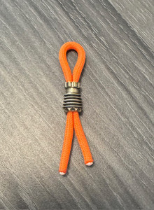 Brass Finished Bombs Away Lanyard Bead Brass Finished Bombs Away Lanyard Bead