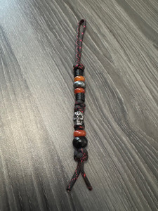 Black and Red Paracord Knife Lanyard with Black Metal, Red Carnelian and Silver Accent Beads Black and Red Paracord Knife Lanyard with Black Metal, Red Carnelian and Silver Accent Beads