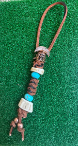 Thick Brown Lace Leather Knife Lanyard with Copper Skull, Rustic Elk, and Turquoise Accent Beads (Requires Large Tang Hole) Thick Brown Lace Leather Knife Lanyard with Copper Skull, Rustic Elk, and Turquoise Accent Beads (Requires Large Tang Hole)