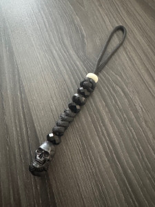 Blackout Series Skull Bead Knife Lanyard with Removable Night Glow Bead Blackout Series Skull Bead Knife Lanyard with Removable Night Glow Bead