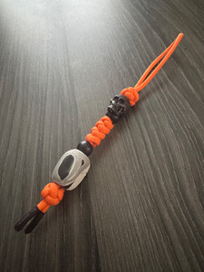 Bright Orange Paracord Knife Lanyard with Black Skull And Black, White, Gray Marbled Acrylic Handcrafted Bead Bright Orange Paracord Knife Lanyard with Black Skull And Black, White, Gray Marbled Acrylic Handcrafted Bead