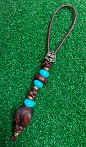Brass Skull Reaper Knife Lanyard with Desert Ironwood, Turquoise, and Brass Beads Brass Skull Reaper Knife Lanyard with Desert Ironwood, Turquoise, and Brass Beads