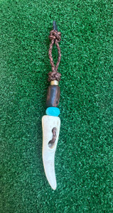 Divot Dangler - Elk Antler Divot Tool with Ironwood Bead, Turquoise, and Brass Accents on Brown Rope Leather Divot Dangler - Elk Antler Divot Tool with Ironwood Bead, Turquoise, and Brass Accents on Brown Rope Leather