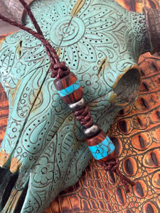 Brown Rope Leather Knife Lanyard with Handmade Ironwood and Black Web Turquoise Tru-Stone Split Beads Accented by Hematite Spacers Brown Rope Leather Knife Lanyard with Handmade Ironwood and Black Web Turquoise Tru-Stone Split Beads Accented by Hematite Spacers
