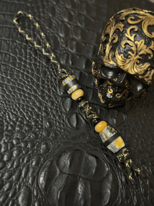 Black & Gold Paracord Knife Lanyard with Silver/Gold Resin and Ebony Handmade Split Beads Accented by Yellow Jade and Onyx Black & Gold Paracord Knife Lanyard with Silver/Gold Resin and Ebony Handmade Split Beads Accented by Yellow Jade and Onyx