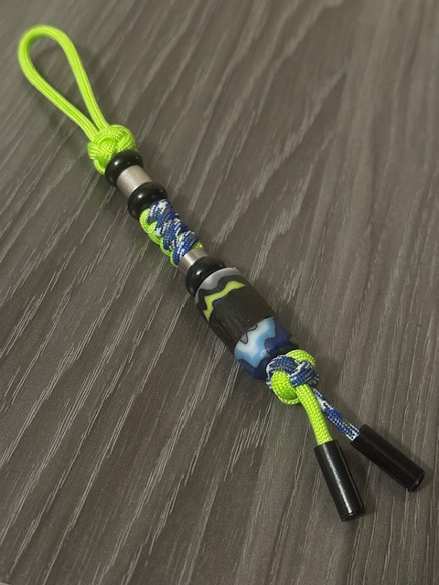 Two-Tone Neon and Multi-Color Blue Paracord with Exotic G10 and Ancient Bog Oak Split Bead Accented by Onyx and Stainless
