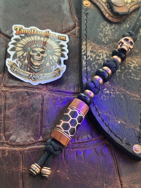 Brazilian Tigerwood, Copper & Black G10 Liners, and Honeycomb Glow In The Dark Resin Bead Lanyard with Onyx Spacers and Copper Skull