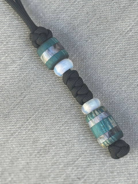 Black Paracord Knife Lanyard with Dyed Teal Wood and Abalone Resin Split Beads Accented by Opalite