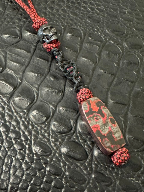 Two-Tone Red & Black Diamond Paracord Knife Lanyard with Black Skull Bead and Handmade Lava Flow Carbon Fiber Bead