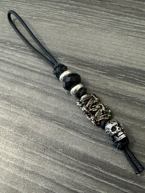 Black Mini Cord Lanyard with Forest Camo Cobra Wrap and Engraved Stainless Skull Accented by Silver Spacers and Black Faceted Beads