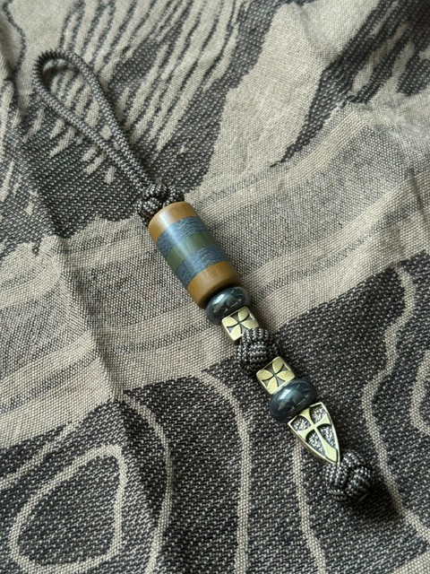 FDE and Black Paracord Tactical Style Lanyard with FDE G10, Silver Carbon Fiber, and OD Green G10 Bead Accented by Hematite, Templar Cross Spacers, and Brass Templar Shield Cross