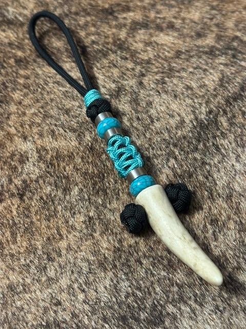 Elk Tine Knife Lanyard On Black 550 Cord with Stainless Accents and Turquoise Mini Cord Cobra Wrap