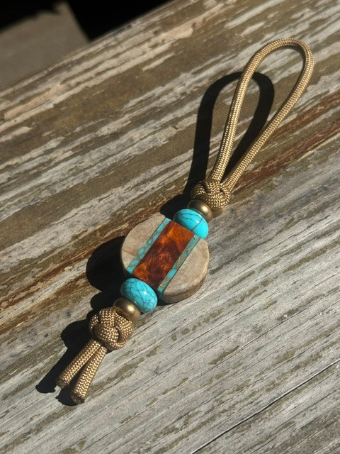 Whitetail Antler, Gold Web Turquoise Tru-Stone, and Amboyna Burl Medallion Bead Knife Nub On Coyote Tan Cord Accented by Turquoise and Polished Brass
