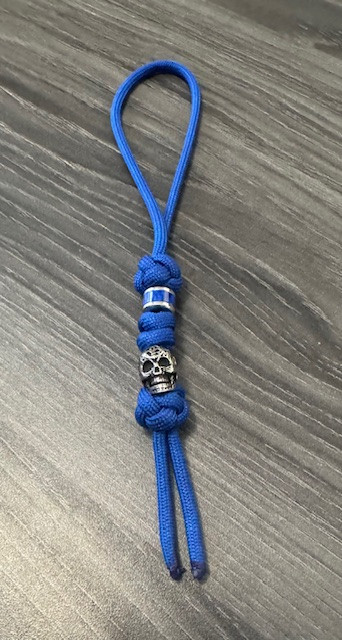 Royal Blue Paracord Knife Lanyard with Blue Carbon Accent Bead and Silver Tribal Skull Bead