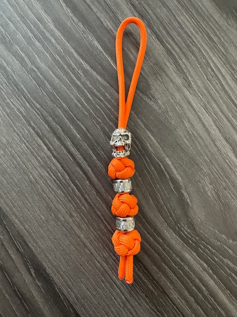 Small Hunter Orange Paracord Knife Lanyard with Skull and Carbon Silver Beads