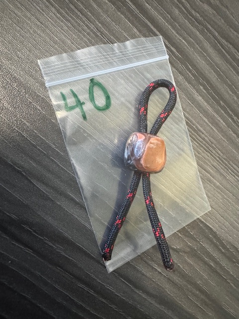 Abstract Red, Black, and Rose Colored Acrylic Knife Lanyard Bead