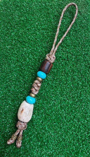 Desert Ironwood Bead Knife Lanyard with Large Polished Elk Antler, Turquoise, and Brass Accents on Desert Camo Paracord