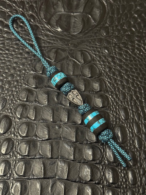 Ebony Wood and Turquoise Tru-Stone Bead Knife Lanyard with Black Shield Cross on Matching Paracord