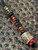 Two-Tone Black and Red Lanyard with Brass Chief of War Accented by Onyx, Brass, and Gnarly Bark Elk Bead