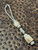 White with Gray Spec Paracord Knife Lanyard with Handmade Elk Antler Beads Accented by White Howlite and Brass