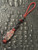 Two-Tone Red & Black Diamond Paracord Knife Lanyard with Black Skull Bead and Handmade Lava Flow Carbon Fiber Bead