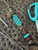 Coyote & Black Diamond Paracord Knife Lanyard with Snakewood, Brown Micarta, and Gold Web Tru-Stone Handmade Bead Accented by Turquoise Mini Cord Cobra Wrap