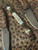 Premium Collection OD Green Knife Lanyard with Tigerwood, Green G10, and Mother of Pearl Split Bead Accented by Opalite & Brass