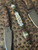Premium Collection OD Green Knife Lanyard with Tigerwood, Green G10, and Mother of Pearl Split Bead Accented by Opalite & Brass