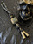 Gold Flake and Shredded Money Resin Knife Nub Lanyard On Black & Gold Paracord
