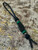 Polished Bison Horn Bead Knife Nub on Black 550 Cord with Copper and Malachite Accents