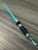 Turquoise Mini Cord Lanyard with Black Cobra Wrap and Engraved Stainless Skull Accented by Silver Spacers and Black Faceted Beads