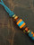 Two-Tone Black Diamond Turquoise & Orange 550 Cord Lanyard with Snakewood, Orange HyperGlow, and Turquoise Split Bead Accented by Polished Brass Reaper