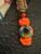 Nautical Themed Brass Octopus Skull & Anchor Bead Lanyard with Multi-Color Infinity Bead and Tan Cobra Knot Wrap Over Orange Paracord