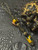 Black & Gold Reactive Paracord Lanyard with Yellow & Green Drip Resin Handmade Beads Accented by Brass Spiral Spacers & Onyx