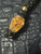 Coffin Collection Gold Flake & Shredded Money Resin Bead On Reactive Black/Gold Cord with Polished Brass Skull and Lava Rock Accents