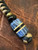 Brass Anubis Bead Lanyard on FDE and Black Paracord with Handmade G-Carta, Tan G10, and Black G10 Bead Accented by Onyx & Brass