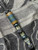 FDE and Black Paracord Tactical Style Lanyard with FDE G10, Silver Carbon Fiber, and OD Green G10 Bead Accented by Hematite, Templar Cross Spacers, and Brass Templar Shield Cross