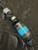 Black Carbon Fiber, Silver Carbon Fiber, and Turquoise Tru-Stone Split Bead Knife Lanyard On Black 550 Cord with Stainless Spacer, Onyx Spacer, and Gray Mini Cord Accent