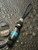 Black Carbon Fiber, Silver Carbon Fiber, and Turquoise Tru-Stone Split Bead Knife Lanyard On Black 550 Cord with Stainless Spacer, Onyx Spacer, and Gray Mini Cord Accent