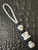Arctic Camo Paracord Shorty Lanyard with White/Black Resin Hourglass Shaped  Bead Accented by Stainless and Faceted Black Spacers