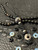 Black 550 Paracord Knife Lanyard with Mother of Pearl Infinity Bead Accented by Onyx and Stainless Spacers