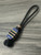 Custom Split Bead Knife Nub with Black Carbon Fiber, Dyed Blue Burl, Tan G10, Black G10, and Copper Accented by Onyx and Copper Spacers On Black 550 Cord