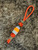 Hunter Orange Paracord Knife Lanyard with Elk Antler and Orange Glow Resin Bead Accented by White Turquoise, Brass, and Coyote Tan Mini Cord Wrap