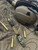 Tactical Collection Sculpted OD Green & Black Layered G10 Bead Knife Lanyard with Black Skull on Jungle Camo Paracord Accented by FDE Mini Cord Wrap, Onyx, and Brass