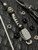 Two-Tone Black and Arctic Camo Paracord Knife Lanyard with Stainless Skull Bead and Smooth Polished Silver Carbon Fiber Bead