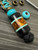 Custom Tri-Color Paracord Knife Lanyard with Deep Blue Micarta, Black G10, Tiffany G10, and Stabilized Hemp Wood Bead Accented by Brass, Turquoise, and Mini Cord Wrap