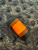 Swamp Green Dyed Curly Maple, Black G10, Orange G10, and Orange Hyperglow EDC Lanyard Bead