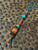 Two Tone Turquoise/Black Diamond and Hunter Orange Paracord Knife Lanyard with Snakewood, Orange Griptec, and Turquoise Tru-Stone Split Bead Accented by Brass & Turquoise Spacers